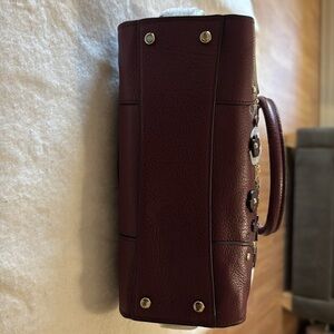 Coach bag/ burgundy color : has cross strap / medium